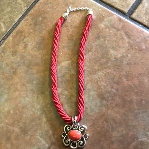 Red twisted seed bead with silver and red pendant